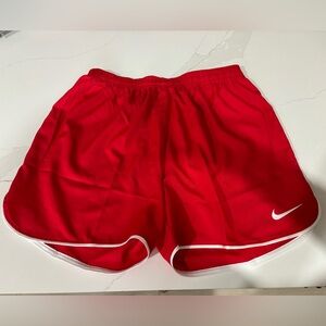New Nike slim dri- fit medium red white trim shorts.